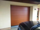 Sekční vrata UniTherm - panel Innovo o síle 60 mm, design panel bez prolisu, barva hnědá RAL 8003